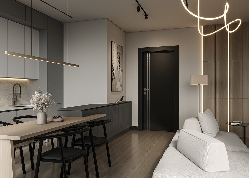 Modern open-plan living space with kitchen, dining table, and sofa