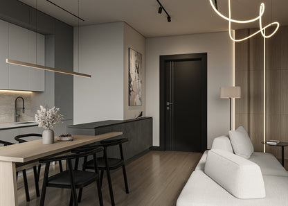 Modern open-plan living space with kitchen, dining table, and sofa